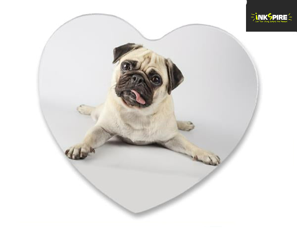 Heart-shaped pillow with a pug on a white background, branded 'Inkspire'.